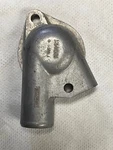 Genuine Stanpart 134681 Triumph 2.5PI Thermostat Water Elbow (injection Only). Fixed Price $30.00.