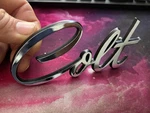 1974-1979 Nos Dodge Colt Front Fender Emblem. Fixed Price $40.00.