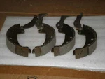 Fiat Rear Brake Shoes W/ Levers, Brava, 131. Fixed Price $10.00.